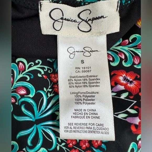 Jessica Simpson Estilo Black Floral Ruffle One-Piece
Swimsuit - Picture 10 of 11